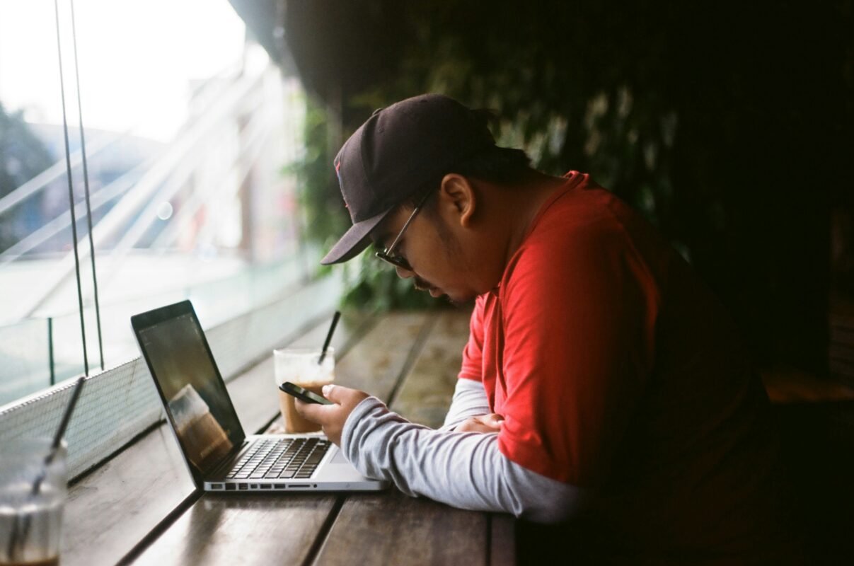  A guy Working in a internet cafe